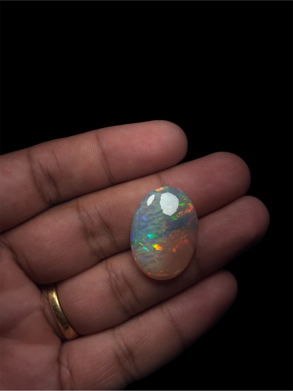 Natural Ethiopian Multicolor Opal Oval Cabochon 28.51x20.45x7.6mm